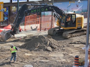 Construction on London's Dundas Place flex will now continue through the weekends and overnight as crews hustle to complete the work before an "end of fall" deadline. (MEGAN STACEY/The London Free Press)