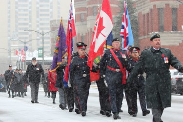 Participants in the Remembrance Day parade gathered outside the Delta Hotel before marking their way to the Cenotaph in Victoria Park on Monday, Nov. 11, 2019. (DALE CARRUTHERS, The London Free Press)