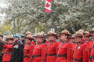 Members of the RCMP stand at attention during the Remembrance Day ceremony Victoria Park on Monday, Nov. 11. (DALE CARRUTHERS, The London Free Press)