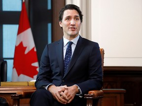 Prime Minister Justin Trudeau speaks at a meeting with Conservative Party Leader Andrew Scheer on Parliament Hill in Ottawa, Nov. 12, 2019.