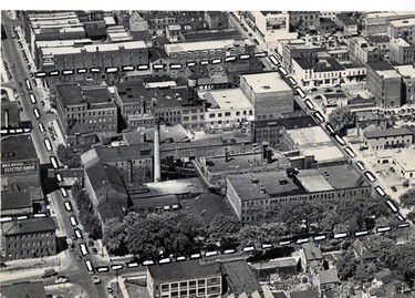 Plans for a $5M London project under way to be located within the white lines in this aerial photo, bounded by King-York and Wellington, from General Steel Wares Ltd., 1955. (London Free Press files)