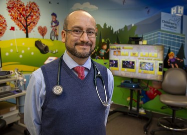 Paediatric cardiologist Dr. Luis Altamirano wants video game designers to incorporate a dimension of physical activity for the game players in all future products. He was photographed Victoria Hospital in London, Ont. on Thursday October 31, 2019. Derek Ruttan/The London Free Press/Postmedia Network