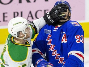 London Knights player Gerard Keane was assessed a two-minute roughing penalty for face-washing Jonathan Yantsis of Kitchener Rangers during the second period of their game  in London, Ont. on Sunday November 17, 2019. Derek Ruttan/The London Free Press/Postmedia Network