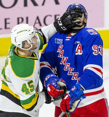 London Knights player Gerard Keane was assessed a two-minute roughing penalty for face-washing Jonathan Yantsis of Kitchener Rangers during the second period of their game  in London, Ont. on Sunday November 17, 2019. Derek Ruttan/The London Free Press/Postmedia Network