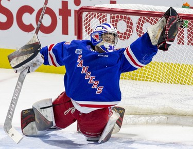 Kitchener Rangers goalie Nathan Torchia snags the puck during the second period of their game against the London Knights in London, Ont. on Sunday November 17, 2019. Derek Ruttan/The London Free Press/Postmedia Network