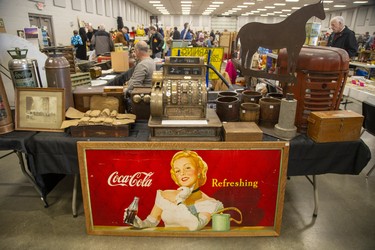 This double sided Coca-Cola poster from the 1930's was selling for $935 at the Woodstock Nostalgia Show at the Woodstock Fairgrounds in Woodstock, Ont. on Sunday November 17, 2019. Derek Ruttan/The London Free Press/Postmedia Network