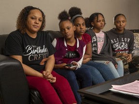 Raquel Armbrister with her daughters and a niece — Lakaye, 11, niece Rianna Pinder, 12, Lakia, 12, and Lakelle, 15 — and husband were left without a place to live in what appeared to be a rental scam. (Derek Ruttan/London Free Press)