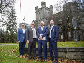 (L to R): Middlesex County CAO Bill Rayburn, York Developments chairman Mike Meddaoui, York Developments president Ali Soufan and Middlesex County Warden Kurtis Smith announced that the County has a conditional agreement to sell its marquee downtown London properties at 50 King St. and 399 Ridout St. to York Developments. Photo taken Nov. 27, 2019. (Derek Ruttan/The London Free Press)