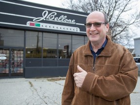 Brian Lester, executive director of Regional HIV/AIDS Connection, celebrates the dismissal of land-use appeals against the future safe injection site in a former musical instruments shop in London on Thursday. (Derek Ruttan/The London Free Press)