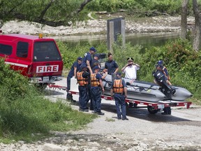 Two firefighters were rushed to hospital after sustaining injuries in this Zodiac water craft during a training exercise at Fanshawe Lake  in London, Ont. on Friday June 15, 2018. Derek Ruttan/The London Free Press/Postmedia Network