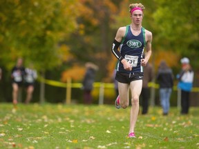 Laurier's Mathew Mason leaves the rest behind early in the senior boys TVRA cross-country final at Springbank Park.  (Mike Hensen/The London Free Press file photo)