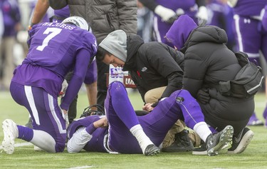 Mustangs quarterback and league MVP Chris Merchant lies injured on the turf after being sacked during the Yates Cup against the McMaster Marauders on Saturday November 9, 2019. Merchant was hobbled early by a bad ankle and the sack took him out of game, until returning to run the Mustangs final series after the game was lost 29-15.
Mike Hensen/The London Free Press/Postmedia Network