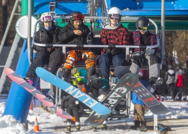 Skiers and snowboarders from the entire region lined up to get the first runs of the season this weekend during the first days of operation at Boler Mountain in London. The non-profit opened their 73rd year Saturday, their earliest opening in 30 years. Mike Hensen/The London Free Press/Postmedia Network