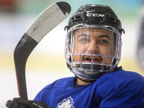 Max Vinogradov of the London Nationals chats with teammates during a practice at the Western Fair Sports Centre.  (Mike Hensen/The London Free Press)
