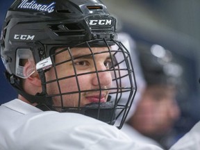 Michael Boushy of the Nationals watches from the bench during a practice at the Western Fair Sports Centre.  (Mike Hensen/The London Free Press)