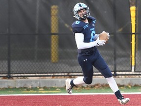 Will Adam, of London's A.B. Lucas Vikings scores a late touchdown during OFSAA Western Bowl action with the Huron Heights Warriors on Thursday, Nov. 28, 2019 at Ron Joyce Stadium at McMaster University in Hamilton. Huron Heights won the game 41-19. (Cathie Coward/Hamilton Spectator)