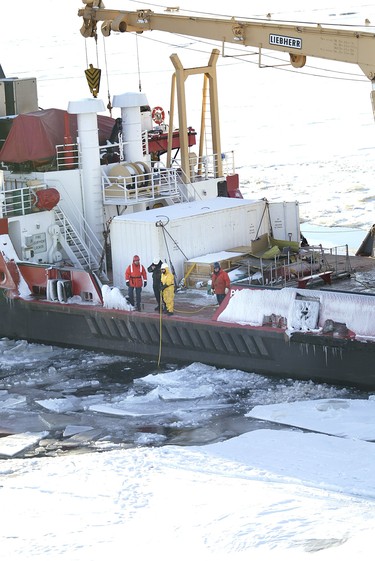 Plane crash investigators aboard the Canadian Coast Guard vessel Samuel Risley lower a remote-operated vehicle into Lake Erie near the submerged wreckage of Cessna Caravan which crashed west of Pelee Island on January 17, 2004 killing ten people.  (The Windsor Star - NICK BRANCACCIO)