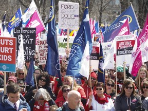 Thousands of teachers, students and union leaders gathered on the front lawn at Queen's Park to protest the Ford government's education cuts on Saturday, April 6, 2019.