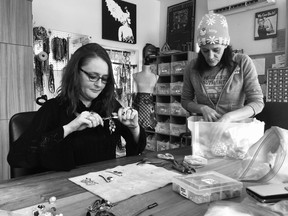 Micro Enterprise artisans Tish Allen, left, and Judith Moore work on craft projects in the studio behind My Sisters' Place in London. The women in the program make jewelry and other one-of-a-kind art to sell, and share a portion of the proceeds to support the program. (Jennifer Bieman/The London Free Press)