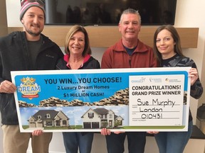 Dennis Reed and and Sue Murphy, with son Jon Sweitzer and daughter Erika Mercer, said they were thrilled to find out they won the Dream Lottery supporting London hospitals on Thursday. The couple get to pick one of two houses or $1 million. (Heather Rivers, The London Free Press)