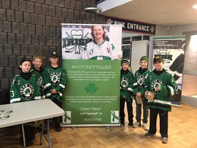 The Lucan Irish pee-wee rep team have been handing out hockey cards with Nick Smith's face on them in return for donations to the CMHA. Smith lost his struggle with mental-health problems in October.