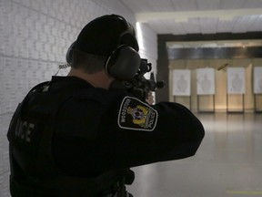 Woodstock police Const. Joel Harrington shoots a round from the C8 patrol carbine rifle in Woodstock, Ont. on Wednesday December 18, 2019 from the police shooting range. The Woodstock police will have eight officers trained to use the C8. (Greg Colgan/Woodstock Sentinel-Review)