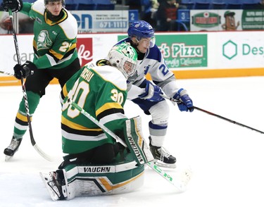 Shane Bulitka, of the Sudbury Wolves, looks for a rebound against Brett Brochu, of the London Knights, during OHL action at the Sudbury Community Arena in Sudbury, Ont. on Friday December 20, 2019. John Lappa/Sudbury Star/Postmedia Network