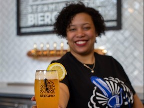 A simple shandy - equal parts Steam Whistle Pure Pilsner and lemonade - is served by Eleanor Henriquez at the Steam Whistle Biergarten in downtown Toronto.