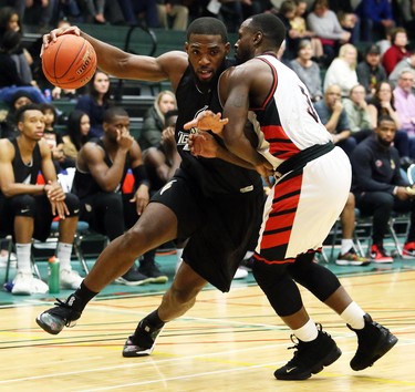 London Lightning's Marvin Singleton, left, tries to drive past Windsor Express's Chris Jones in the second half of a National Basketball League of Canada exhibition game at St. Clair College's Chatham Campus HealthPlex in Chatham, Ont., on Saturday, Dec. 14, 2019. Mark Malone/Chatham Daily News/Postmedia Network