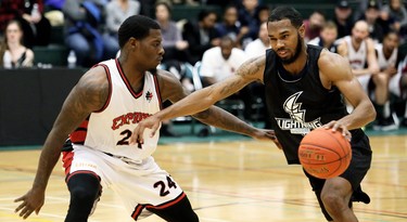 London Lightning's Jaylon Tate, right, is guarded by Windsor Express's Davon Dillard in the second half of a National Basketball League of Canada exhibition game at St. Clair College's Chatham Campus HealthPlex in Chatham, Ont., on Saturday, Dec. 14, 2019. Mark Malone/Chatham Daily News/Postmedia Network