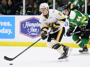 Sarnia Sting's Ryan Roth (37) skates away from London Knights' Jonathan Gruden (44) in the first period at Progressive Auto Sales Arena in Sarnia, Ont., on Sunday, Dec. 29, 2019. (Mark Malone/Postmedia Network)