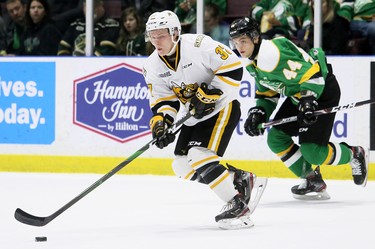 Sarnia Sting's Ryan Roth (37) skates away from London Knights' Jonathan Gruden (44) in the first period at Progressive Auto Sales Arena in Sarnia, Ont., on Sunday, Dec. 29, 2019. (Mark Malone/Postmedia Network)