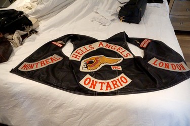 Police seized cash, guns, houses, vehicles, Hells Angels apparel and more during an investigation into an illegal gambling ring linked to organized crime groups. (OPP supplied photo)