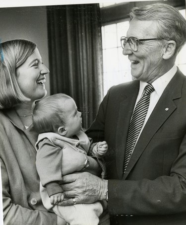 Dr. Henry Barnett, receives an award, with his daughter Jane Drake and granddaughter Madeline, 1988. (London Free Press files)