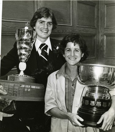 Jamie Bone and Janet Dick display awards won at Western's athletic banquet, 1979. (London Free Press files)