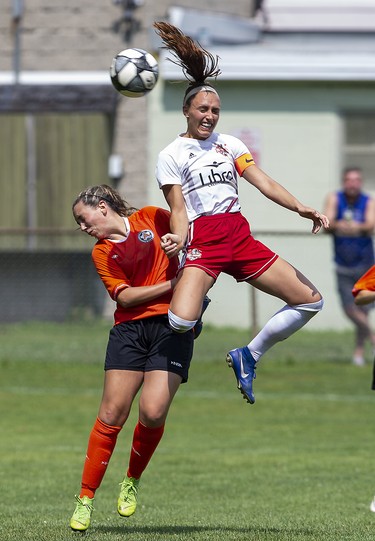 FC London Striker Jade Kovacevic heads the ball toward the Alliance FC net past defender Jade Vyfhuis during the final game of the regular season at the German Canadian Club in London on Sunday July 28, 2019. The locals defeated the team from Markham by a score of 7-1. Kovacevic scored twice and assisted on three others. (Derek Ruttan/The London Free Press)