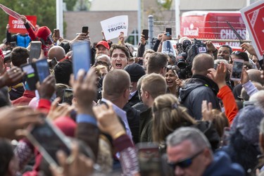 Liberal Party Leader Justin Trudeau wades through a sea of supporters during a campaign stop at the campaign office of  London-Fashawe candidate Mohamed Hammoud in London on Monday October 14, 2019. (Derek Ruttan/The London Free Press)