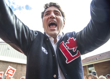 Liberal Party Leader Justin Trudeau greets supporters during a campaign stop at the campaign office of London-Fashawe candidate Mohamed Hammoud in London on Monday October 14, 2019. (Derek Ruttan/The London Free Press)