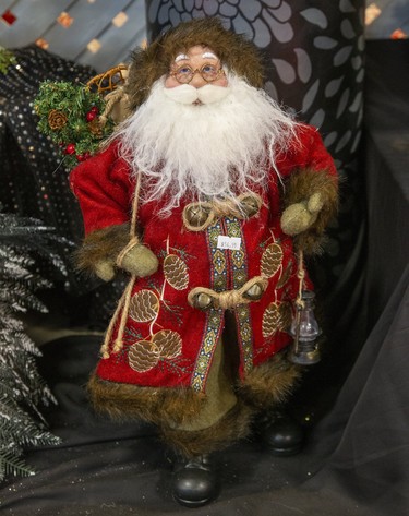 A Santa Claus figure on display at Victorian Elegance one the vendors featured at the 40th Annual Christmas Craft Event at the Western Fair Agriplex  in London, Ont. on Sunday December 1, 2019. Derek Ruttan/The London Free Press/Postmedia Network