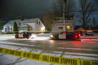 Police cruisers are parked on Simcoe Street in Exeter, Ontario where witnesses said a man was shot on Tuesday December 3, 2019. Derek Ruttan/The London Free Press/Postmedia Network