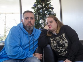 Matt and Natalie Larose were recently swindled out of more than $2,000 through an online 'loan' scam. (Derek Ruttan/The London Free Press)