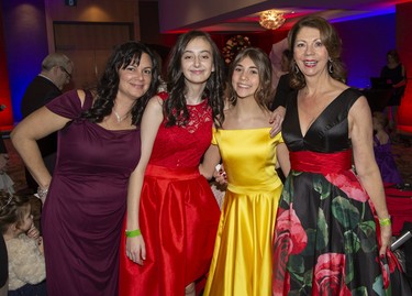 Kecia Leach, left, is with her daughter Kate, 12, Ella Brophy, 12, and her mother Elana Johnson, who also is the chair of the Children's Health Foundation, at the Children's Magical Winter Ball at RBC Place  in London, Ont. on Friday Dec. 6, 2019. The event, billed as London's only family friendly black tie event, raised money for the Children's Health Foundation. All proceeds will support the child life program the Children's Hospital of Western Ontario. Derek Ruttan/The London Free Press