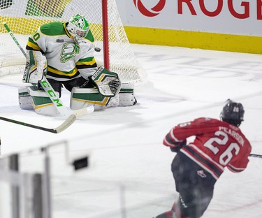 Owen Sound Attack forward Josh Pearson scores on London Knight goalie Brett Brochu in the first period of their game at Budweiser Gardens in London, Ont. on Saturday December 7, 2019. Derek Ruttan/The London Free Press/Postmedia Network