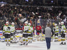 Stuffed animals rain down on the ice surface at Budweiser Gardens during the second period of an OHL hockey game between the London Knights and Owen Sound Attack on Dec. 6, 2019. (Derek Ruttan/The London Free Press)