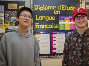 Fourteen year old grade nine students Calvin Cao and Jacob Horak at Banting Secondary School are fighting the end of extended French immersion classes in London. (Derek Ruttan/The London Free Press)