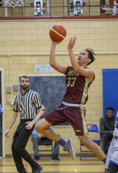 Banting's Michael Oh goes for layup during their TVRA Central senior boys basketball game at Oakridge secondary school in London on Thursday. Banting won the game 53-41. (Derek Ruttan/The London Free Press)