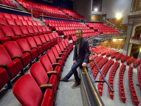 The Grand Theatre's artistic director, Dennis Garnhum, sits in the balcony of the Richmond Street theatre in London. (File photo)