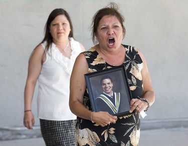 Sue Jamieson, mother of homicide victim Michael Jamieson, had harsh words for the justice system Friday after the acquittal of Kirsten Bomberry at the London courthouse. Through tears she said she’s “very disappointed in the court system." (Derek Ruttan/The London Free Press)