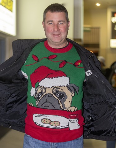 Ron Wammes joins the frivolity at Ugly Sweater Night at the London Knights game against the Sarnia Sting at Budweiser Gardens in London on Friday. (Mike Hensen/The London Free Press)