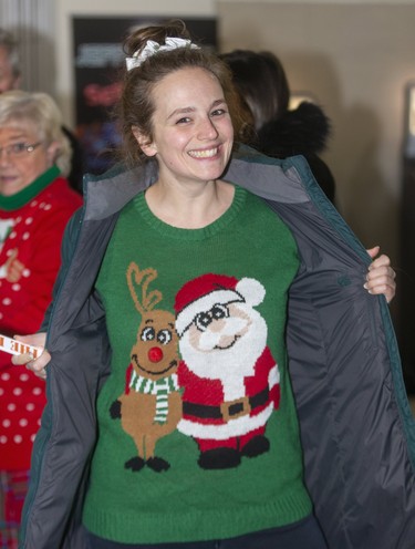 Alicia Thompson gets in the spirit at Ugly Sweater Night at the London Knights game against the Sarnia Sting at Budweiser Gardens in London on Friday. (Mike Hensen/The London Free Press)